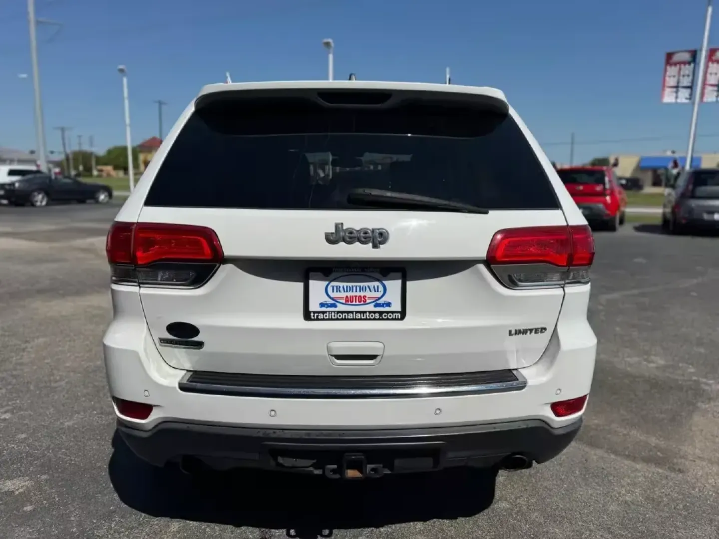 2014 WHITE Jeep Grand Cherokee Limited 2WD (1C4RJEBM5EC) with an 3.0L V6 DOHC 24V DIESEL engine, 5-Speed Automatic transmission, located at 10740 Forest Lane, Dallas, TX, 75243, (972) 272-7300, 32.908588, -96.701813 - **Adventure Awaits with This 2014 Jeep Grand Cherokee Limited!**<br /> <br /> Are you ready to elevate your weekend adventures or enhance your daily commute? Look no further! At Traditional Autos in Dallas, TX, we present the 2014 Jeep Grand Cherokee Limited a vehicle that seamlessly blends rugged - Photo#2