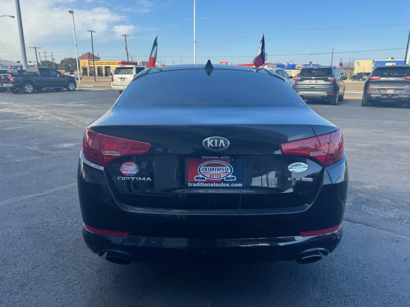 2013 Kia Optima EX (5XXGN4A79DG) with an 2.4L L4 DOHC 16V engine, 6-Speed Automatic transmission, located at 10740 Forest Lane, Dallas, TX, 75243, (972) 272-7300, 32.908588, -96.701813 - **Discover Your Ideal Commuter Companion: 2013 Kia Optima at Traditional Autos!**<br /> <br /> Rev up your daily drive with the 2013 Kia Optima, an exceptional choice for budget-conscious buyers who crave style, comfort, and reliability. Whether you're navigating through the busy streets of Dallas o - Photo#2