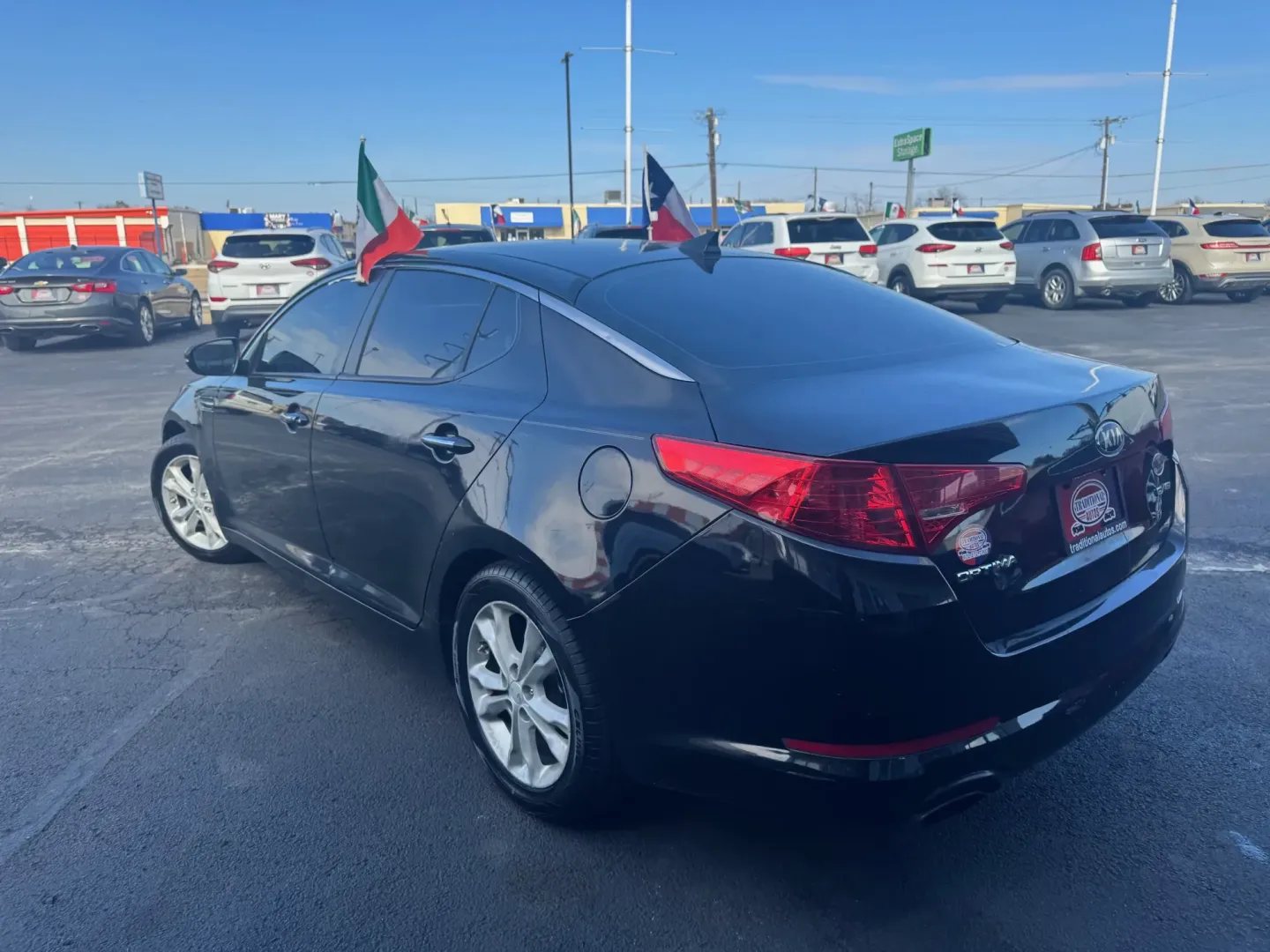 2013 Kia Optima EX (5XXGN4A79DG) with an 2.4L L4 DOHC 16V engine, 6-Speed Automatic transmission, located at 10740 Forest Lane, Dallas, TX, 75243, (972) 272-7300, 32.908588, -96.701813 - **Discover Your Ideal Commuter Companion: 2013 Kia Optima at Traditional Autos!**<br /> <br /> Rev up your daily drive with the 2013 Kia Optima, an exceptional choice for budget-conscious buyers who crave style, comfort, and reliability. Whether you're navigating through the busy streets of Dallas o - Photo#3