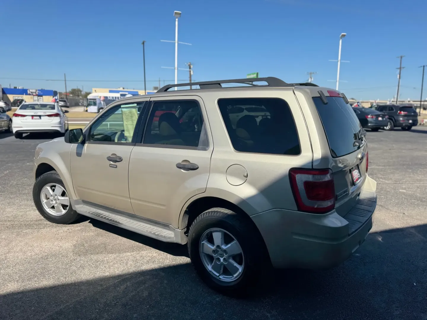 2011 Ford Escape XLT FWD (1FMCU0D7XBK) with an 2.5L L4 DOHC 16V engine, 6-Speed Automatic transmission, located at 10740 Forest Lane, Dallas, TX, 75243, (972) 272-7300, 32.908588, -96.701813 - ### Discover Your Next Adventure with This 2011 Ford Escape SUV!<br /> <br /> Perfect for weekend getaways, daily commutes, or family road trips, this 2011 Ford Escape Sport Utility is a versatile choice for anyone seeking a reliable and spacious vehicle. With its rugged charm and functional feature - Photo#4