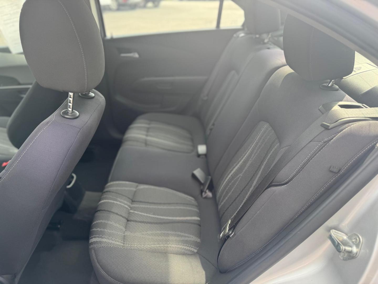 2014 SILVER CHEVROLET SONIC LT LT Auto Sedan (1G1JC5SH9E4) with an 1.8L L4 DOHC 24V engine, 6-Speed Automatic transmission, located at 10740 Forest Lane, Dallas, TX, 75243, (972) 272-7300, 32.908588, -96.701813 - Photo#4