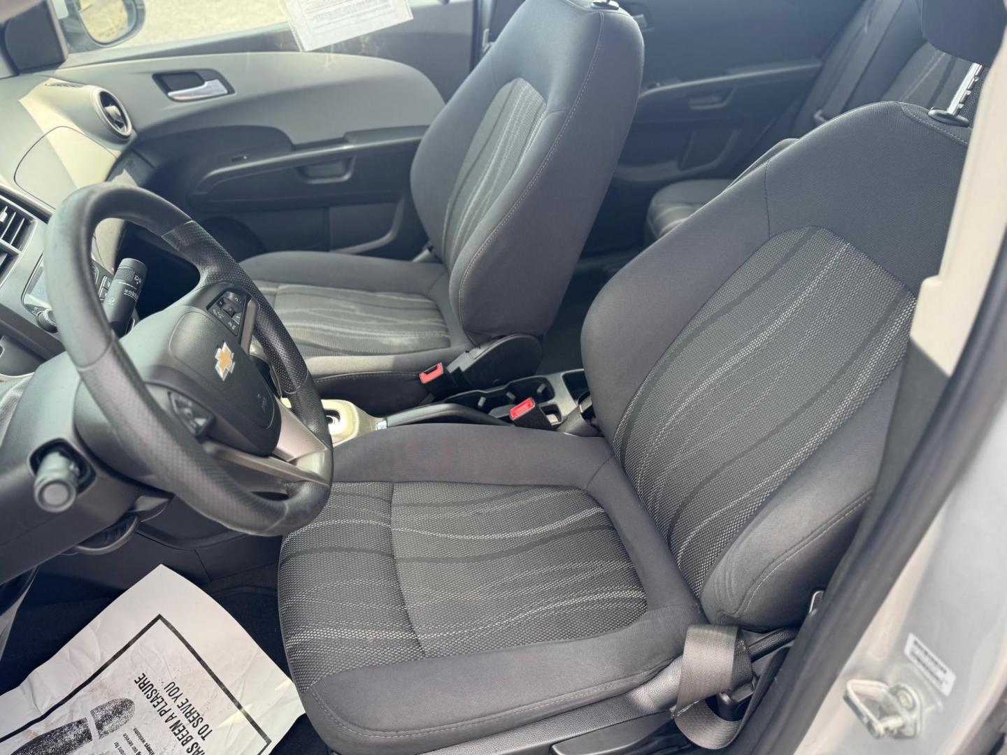 2014 SILVER CHEVROLET SONIC LT LT Auto Sedan (1G1JC5SH9E4) with an 1.8L L4 DOHC 24V engine, 6-Speed Automatic transmission, located at 10740 Forest Lane, Dallas, TX, 75243, (972) 272-7300, 32.908588, -96.701813 - Photo#6