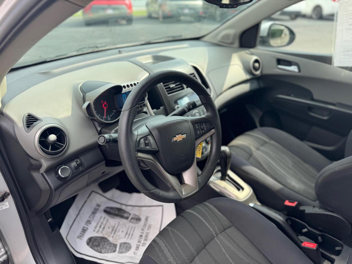 2014 SILVER CHEVROLET SONIC LT LT Auto Sedan (1G1JC5SH9E4) with an 1.8L L4 DOHC 24V engine, 6-Speed Automatic transmission, located at 10740 Forest Lane, Dallas, TX, 75243, (972) 272-7300, 32.908588, -96.701813 - Photo#7