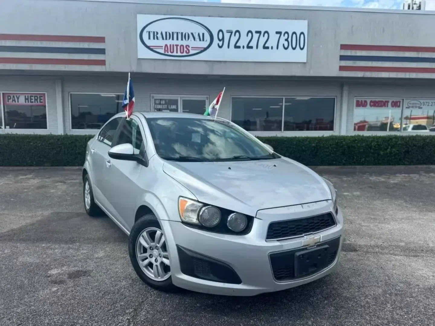 2014 SILVER Chevrolet Sonic LT Auto Sedan (1G1JC5SH9E4) with an 1.8L L4 DOHC 24V engine, 6-Speed Automatic transmission, located at 10740 Forest Lane, Dallas, TX, 75243, (972) 272-7300, 32.908588, -96.701813 - **Unleash Your Daily Adventures with this 2014 Chevrolet Sonic LT Auto Sedan!** <br /> <br /> If you're searching for an affordable vehicle that combines style, comfort, and practicality, look no further than this 2014 Chevrolet Sonic LT Auto Sedan, available now at Traditional Autos in Dallas, TX. - Photo#0