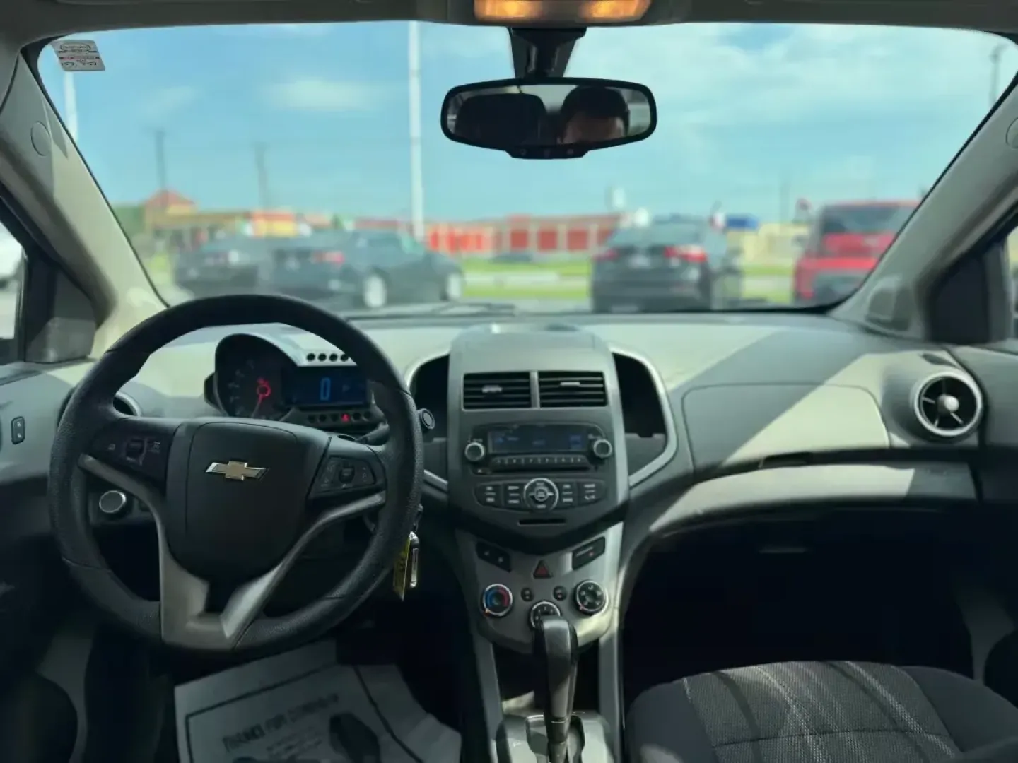 2014 SILVER Chevrolet Sonic LT Auto Sedan (1G1JC5SH9E4) with an 1.8L L4 DOHC 24V engine, 6-Speed Automatic transmission, located at 10740 Forest Lane, Dallas, TX, 75243, (972) 272-7300, 32.908588, -96.701813 - **Unleash Your Daily Adventures with this 2014 Chevrolet Sonic LT Auto Sedan!** <br /> <br /> If you're searching for an affordable vehicle that combines style, comfort, and practicality, look no further than this 2014 Chevrolet Sonic LT Auto Sedan, available now at Traditional Autos in Dallas, TX. - Photo#5