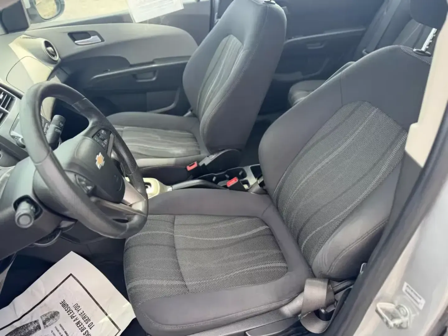 2014 SILVER Chevrolet Sonic LT Auto Sedan (1G1JC5SH9E4) with an 1.8L L4 DOHC 24V engine, 6-Speed Automatic transmission, located at 10740 Forest Lane, Dallas, TX, 75243, (972) 272-7300, 32.908588, -96.701813 - **Unleash Your Daily Adventures with this 2014 Chevrolet Sonic LT Auto Sedan!** <br /> <br /> If you're searching for an affordable vehicle that combines style, comfort, and practicality, look no further than this 2014 Chevrolet Sonic LT Auto Sedan, available now at Traditional Autos in Dallas, TX. - Photo#6