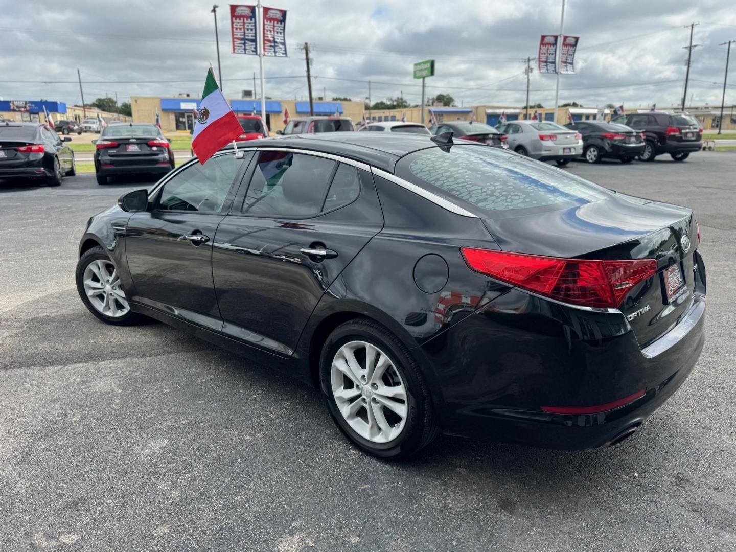 2012 BLACK KIA OPTIMA EX; LX EX (5XXGN4A77CG) with an 2.4L L4 DOHC 16V engine, 6-Speed Automatic transmission, located at 10740 Forest Lane, Dallas, TX, 75243, (972) 272-7300, 32.908588, -96.701813 - Photo#3