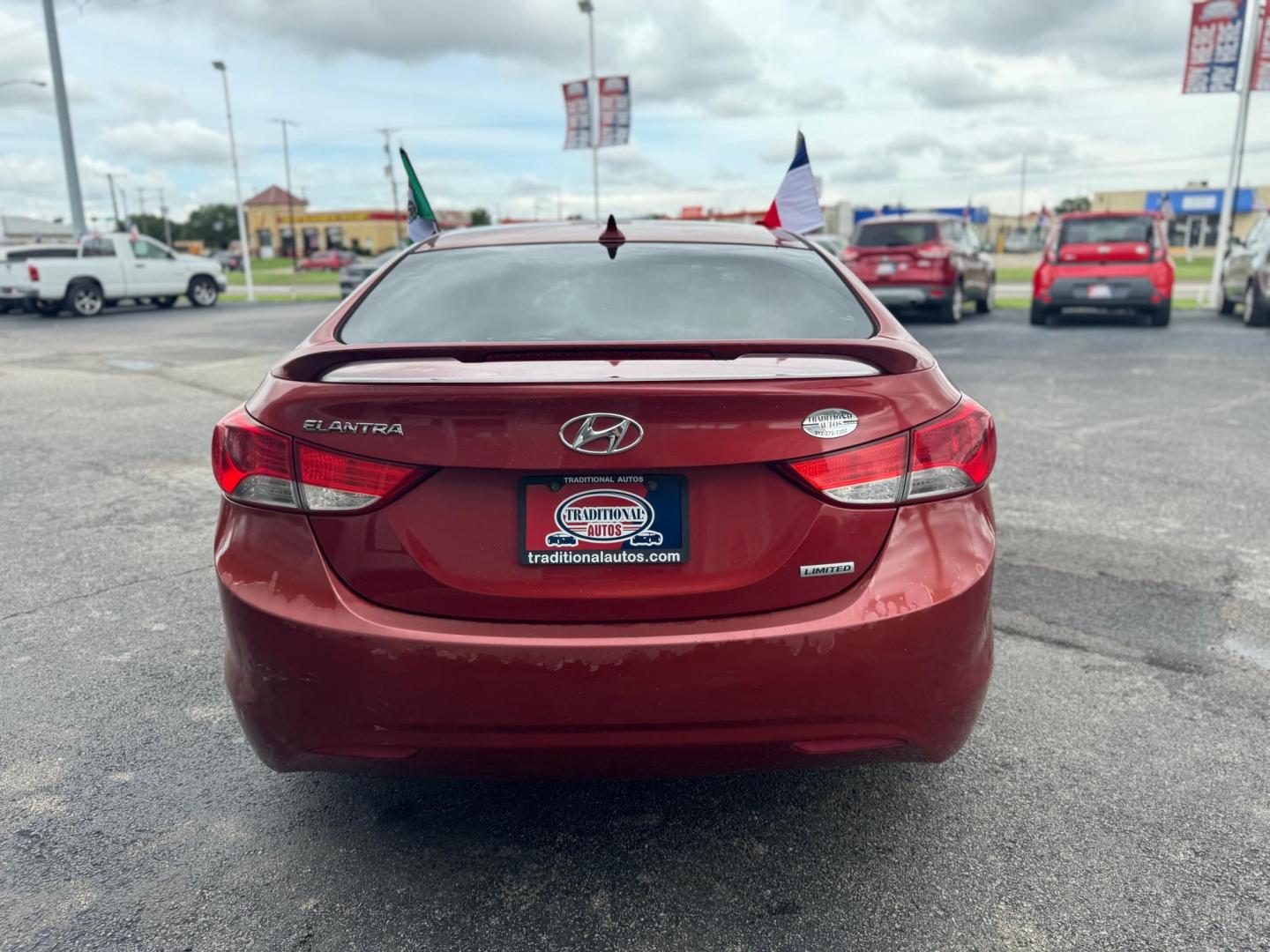 2013 RED HYUNDAI ELANTRA GLS; LIMITED GLS A/T (KMHDH4AE6DU) with an 1.8L L4 DOHC 16V engine, 6-Speed Automatic transmission, located at 10740 Forest Lane, Dallas, TX, 75243, (972) 272-7300, 32.908588, -96.701813 - Photo#2