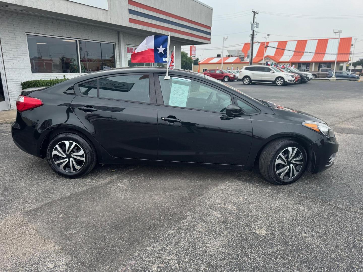 2015 BLACK KIA FORTE LX LX (KNAFK4A68F5) with an 1.8L L4 DOHC 16V engine, located at 10740 Forest Lane, Dallas, TX, 75243, (972) 272-7300, 32.908588, -96.701813 - Photo#2