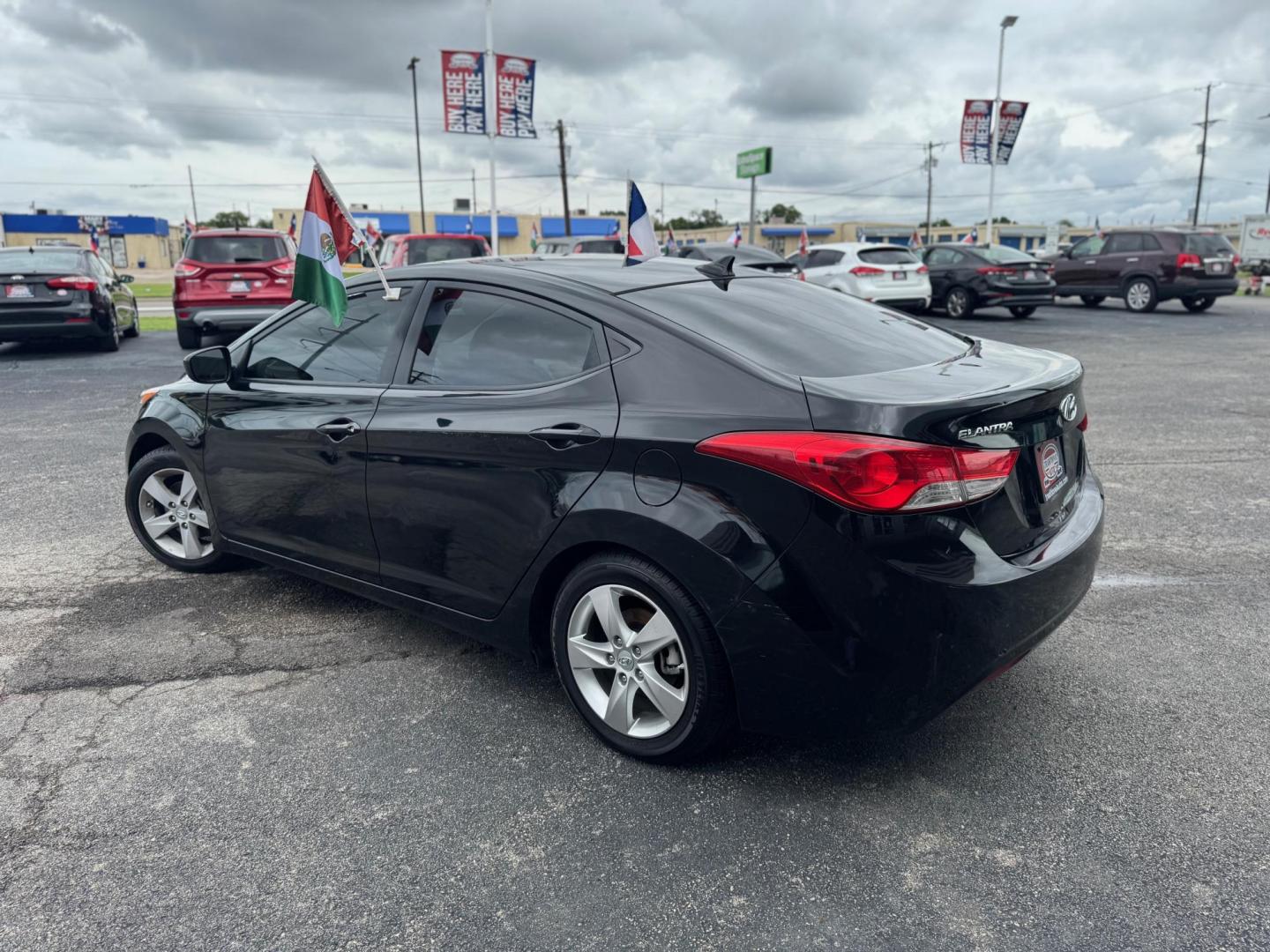 2011 BLACK HYUNDAI ELANTRA GLS; LIMITED GLS A/T (KMHDH4AE7BU) with an 1.8L L4 DOHC 16V engine, 6-Speed Automatic transmission, located at 10740 Forest Lane, Dallas, TX, 75243, (972) 272-7300, 32.908588, -96.701813 - Photo#3