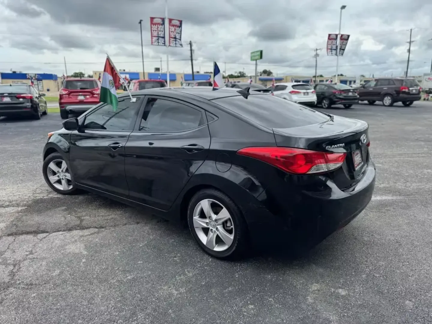 2011 BLACK Hyundai Elantra GLS A/T (KMHDH4AE7BU) with an 1.8L L4 DOHC 16V engine, 6-Speed Automatic transmission, located at 10740 Forest Lane, Dallas, TX, 75243, (972) 272-7300, 32.908588, -96.701813 - Discover a world of possibilities with the 2011 Hyundai Elantra GLS A/T, a versatile sedan perfectly suited for both the daily commuter and the weekend adventurer. At Traditional Autos, located at 10740 Forest Lane, Dallas, TX 75243, we specialize in offering quality used vehicles that meet a variet - Photo#4