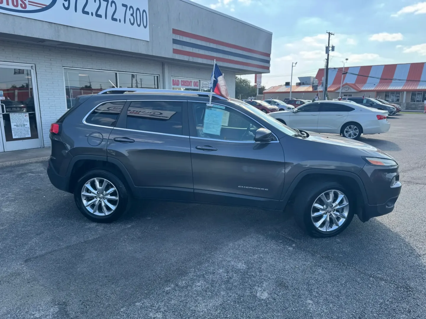 2015 Jeep Cherokee Limited 4WD (1C4PJMDB9FW) with an 2.4L L4 DOHC 16V engine, 9-Speed Automatic transmission, located at 10740 Forest Lane, Dallas, TX, 75243, (972) 272-7300, 32.908588, -96.701813 - Are you ready to embark on life's adventures? Whether you're navigating the bustling streets of Dallas or exploring the scenic beauty of nearby parks, the 2015 Jeep Cherokee is the perfect companion for those seeking a blend of comfort, capability, and style. Ideal for weekend getaways or daily comm - Photo#2
