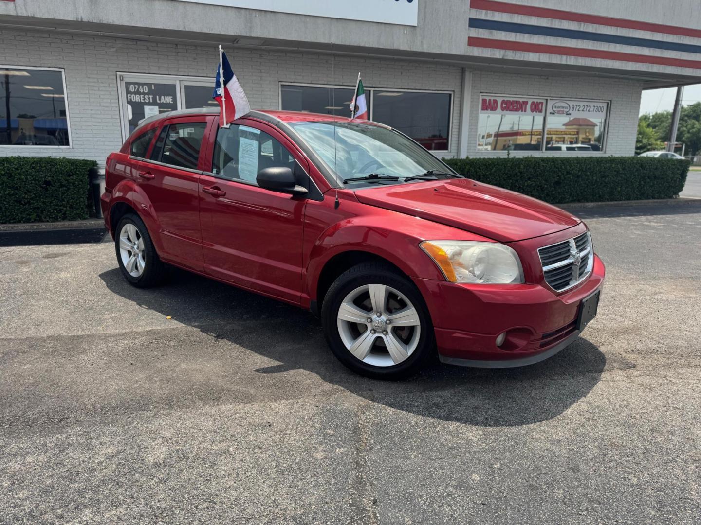 2010 ORANGE DODGE CALIBER UPTOWN Uptown (1B3CB9HB9AD) with an 2.4L L4 DOHC 16V engine, Continuously Variable Transmisson transmission, located at 10740 Forest Lane, Dallas, TX, 75243, (972) 272-7300, 32.908588, -96.701813 - Photo#1