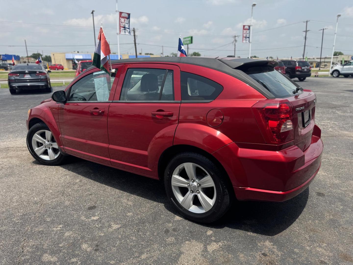 2010 ORANGE DODGE CALIBER UPTOWN Uptown (1B3CB9HB9AD) with an 2.4L L4 DOHC 16V engine, Continuously Variable Transmisson transmission, located at 10740 Forest Lane, Dallas, TX, 75243, (972) 272-7300, 32.908588, -96.701813 - Photo#3