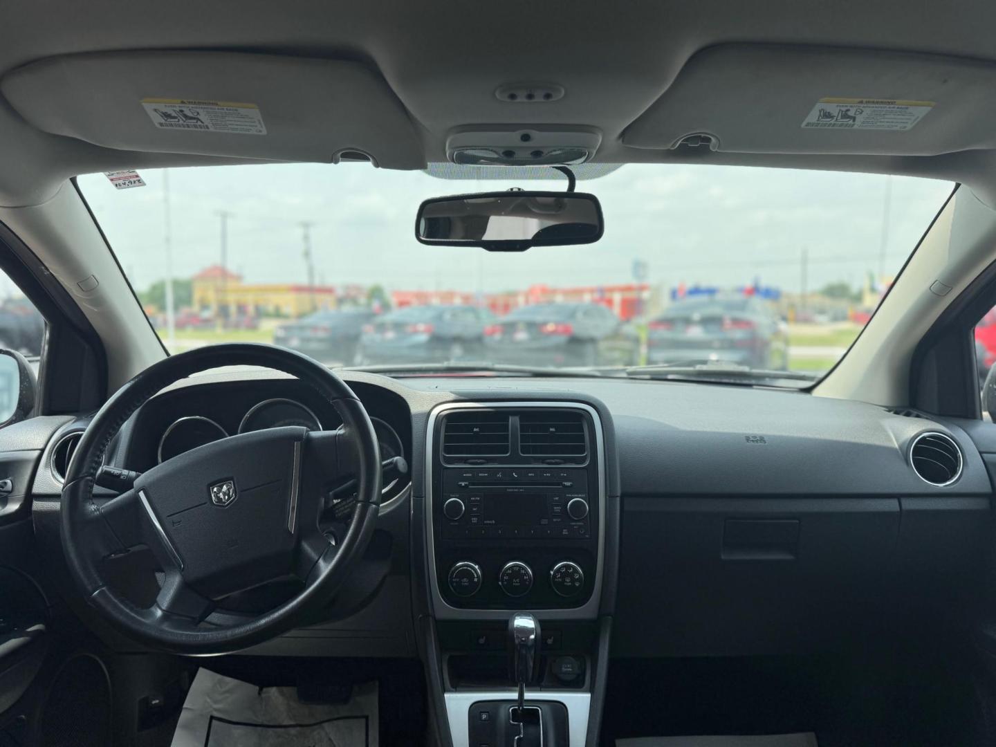 2010 ORANGE DODGE CALIBER UPTOWN Uptown (1B3CB9HB9AD) with an 2.4L L4 DOHC 16V engine, Continuously Variable Transmisson transmission, located at 10740 Forest Lane, Dallas, TX, 75243, (972) 272-7300, 32.908588, -96.701813 - Photo#5